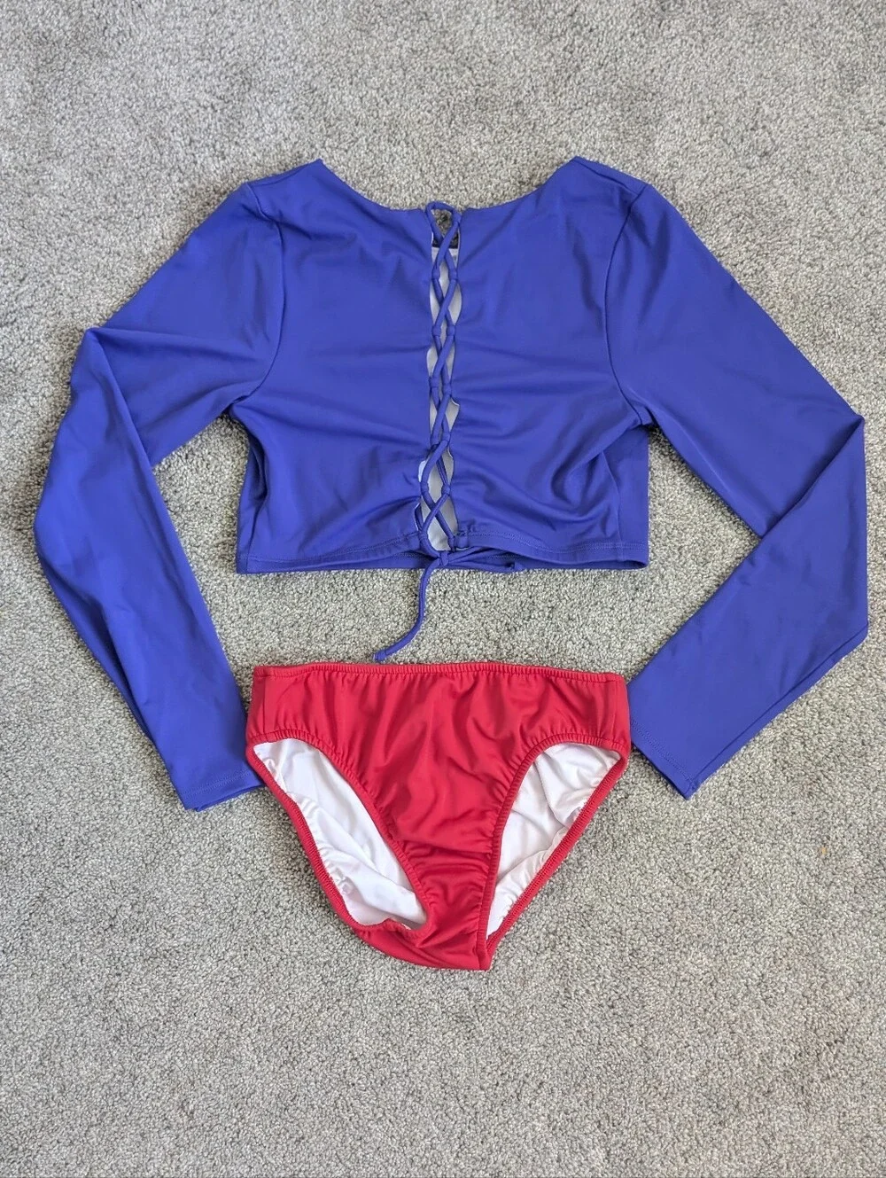 Blue Lace-Up Long Sleeve Rashguard And Red Bikini